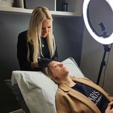 Botox dots being marked on head
