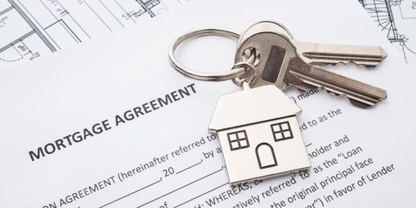 Mortgage agreement forms and a key