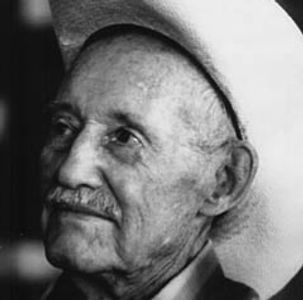 Elmer Staggs Sanctuary Cove cowboy hat old desert wedding overnight cottage history