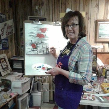 lady instructing art class