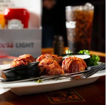 A must try is the Armadillo Eggs at Buzzards Billys in Lincon, NE