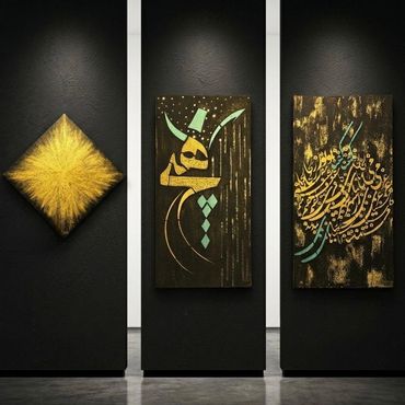 Three artistic panels with abstract and calligraphic designs displayed on black walls.