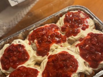 Strawberry cinnamon rolls displayed in 6-count.