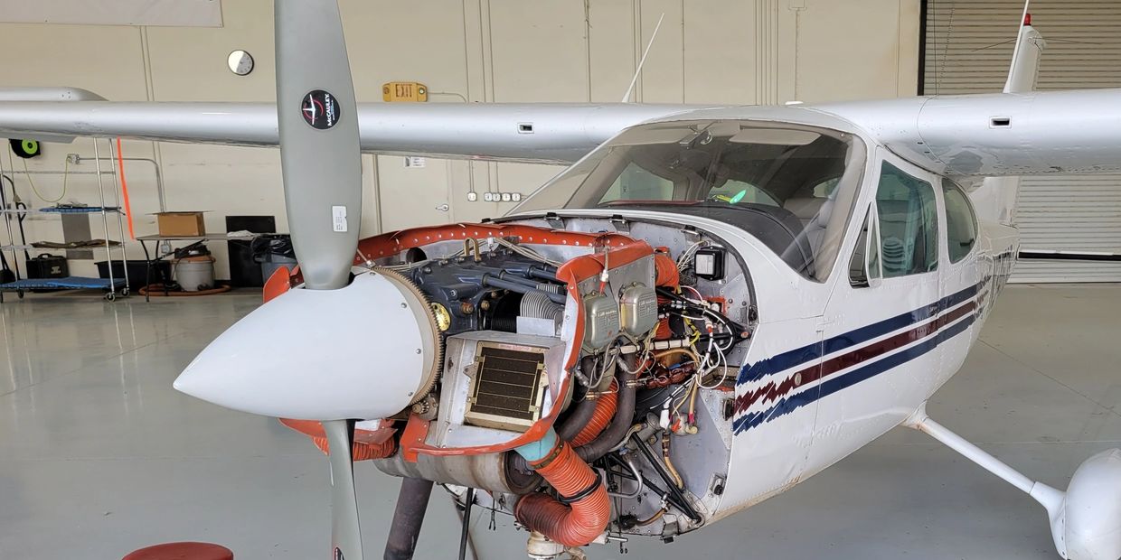 Piston aircraft with engine cover off