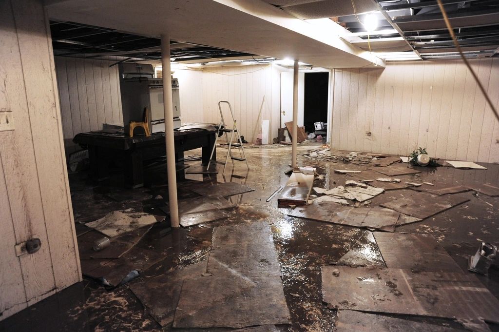 Flooded basement with water damage