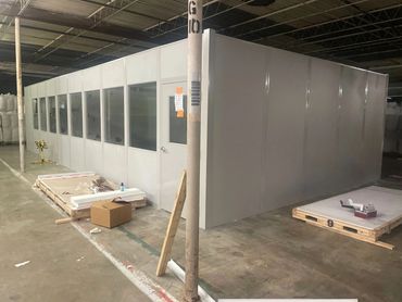 A grey modular office building completed