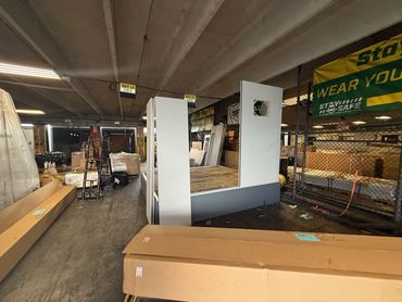 Modular Installations of a prefab building inside a warehouse setting by SoFlo installations