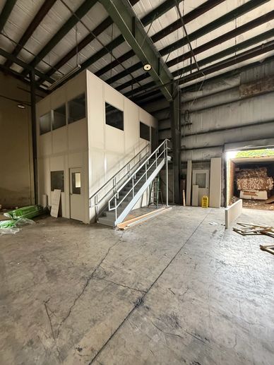 A newly modular two-story office building constructed inside a warehouse for Atlas in Opa Locka FL.