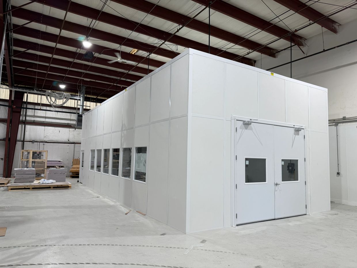 A new modular tall-wall office installation with windows, double door, by SoFlo installations