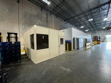 A pre-fabricated Modular Office constructed inside a warehouse setting by SoFlo Installations