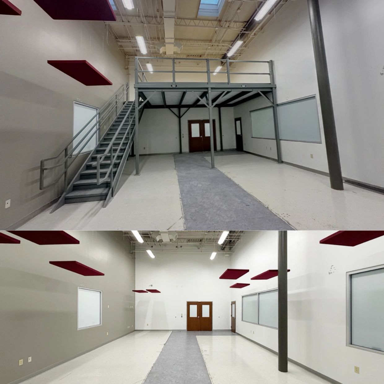 A grey metal mezzanine platform with a safety railing and a matching staircase on the left.