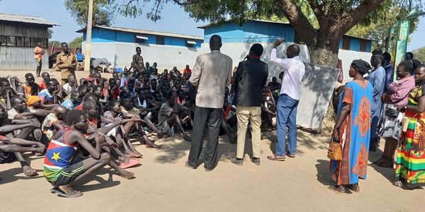Sharing the gospel with the prisoners.