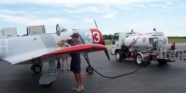 Solo Aviation line crew fueling airplane