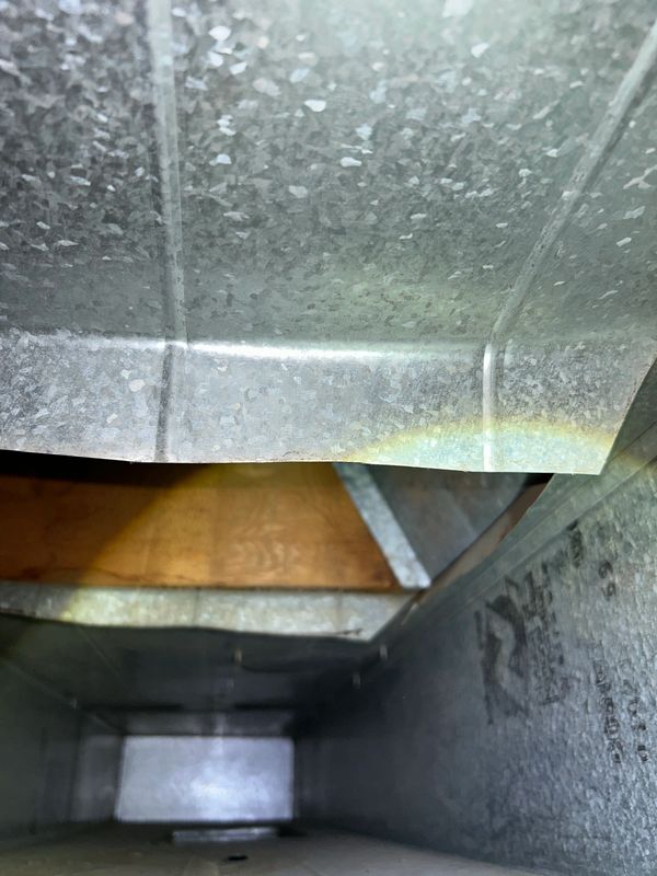 Interior of a metallic duct or vent.