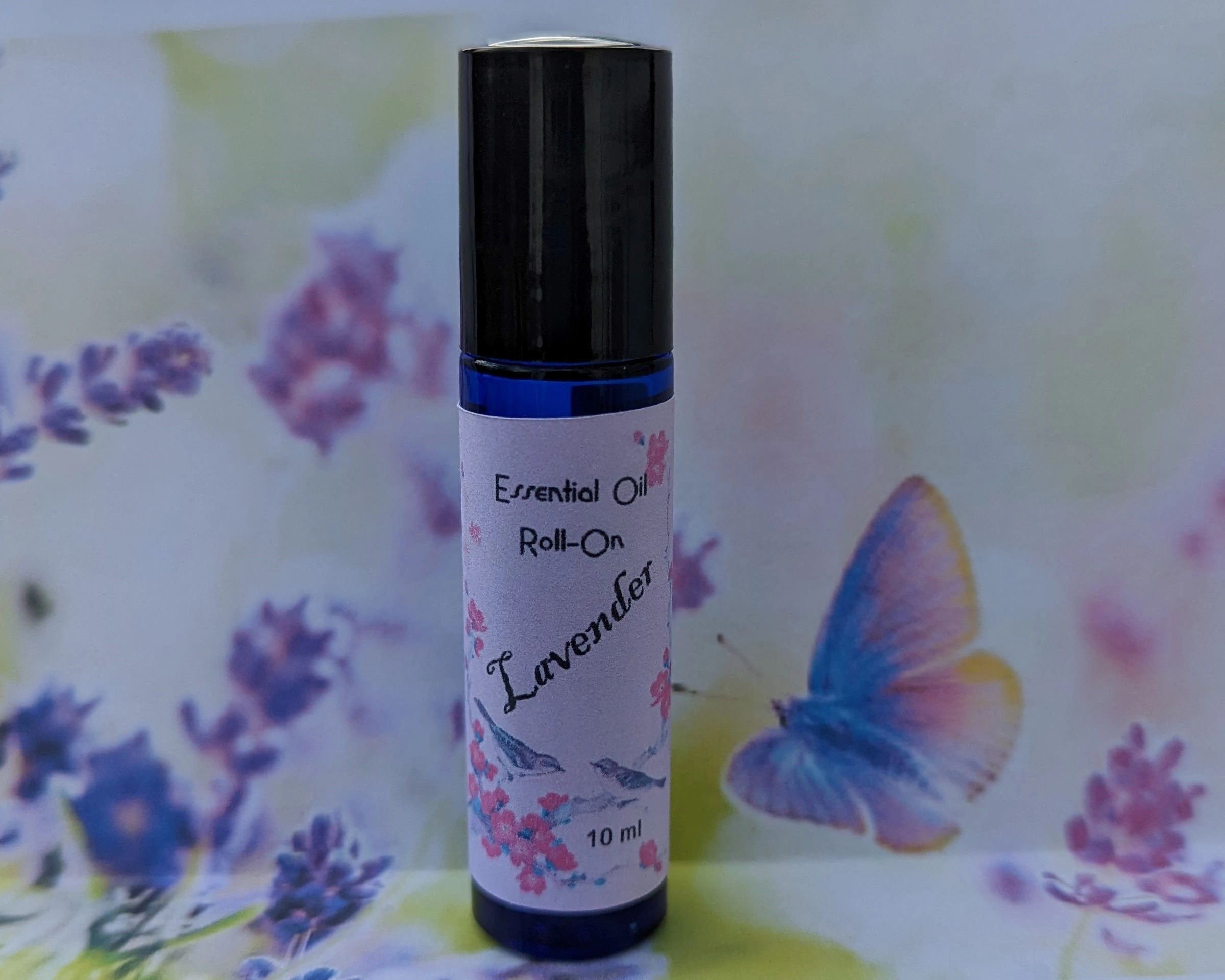 Essential Oil Roll On, assorted varieties and a selection of carrier oils.