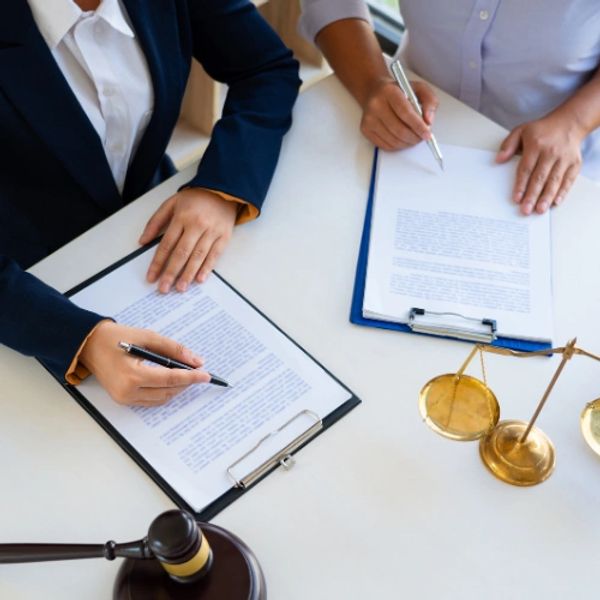 Group of people signing documents. Divorce