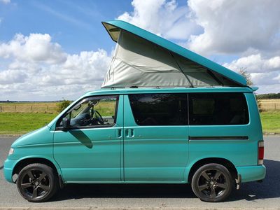 A Mazda Bongo Campervan 4 berth 6 seater with built in Kitchen. and pop up roof