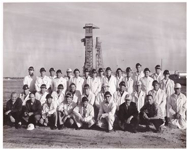 John Glenn bottom row left, Gene next to him, and Scott Carpenter bottom row right.