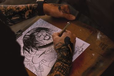 Drawing at a show.