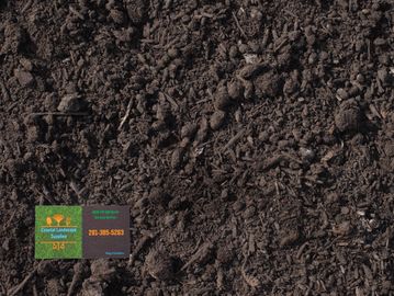 Premium Garden Mix or Mushroom Compost with Coastal Landscape Supplies business card in the corner.