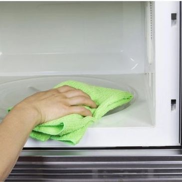 Wiping down a microwave