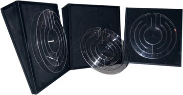 Acrylic Maze 
puzzle with removable maze .  For moving magnetic objects through the maze.