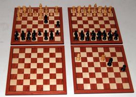 When chess pieces are moved to a preset position, a circuit is closed and can control other devices.