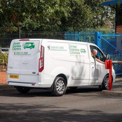 Dorset Express Couriers van arriving to collect goods from client's site.