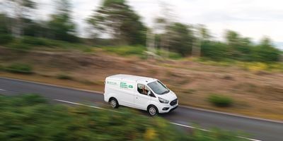 Dorset Express Couriers van travelling through the countryside on a crucial same day delivery.
