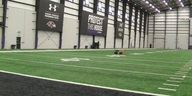 BALTIMORE RAVENS INDOOR TRAINING FACILITY. UNDER ARMOUR POWERHOUSE