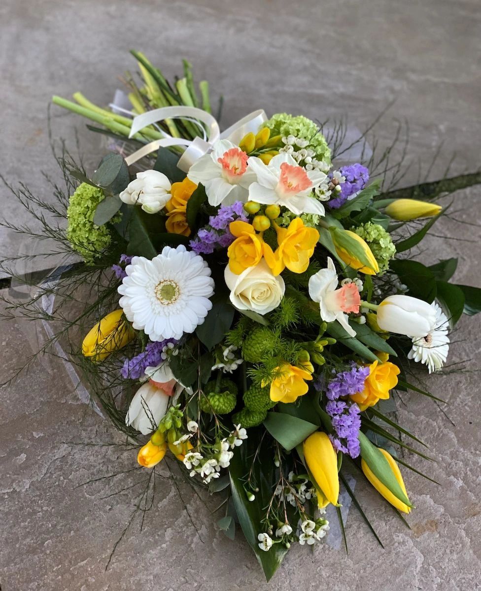 spring hand tied funeral sheet with daffodils, freesia and tulips
#floristchristchurch #christchurchfuneralflowers #localflorist