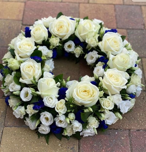 white rose funeral wreath
