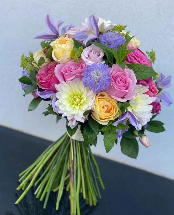 Pink, peach, blue and white summer bridal bouquet