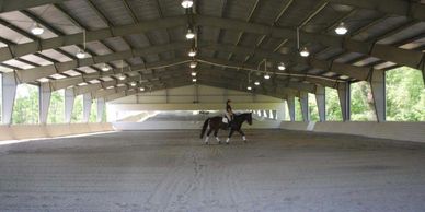 A horse rider practicing alone