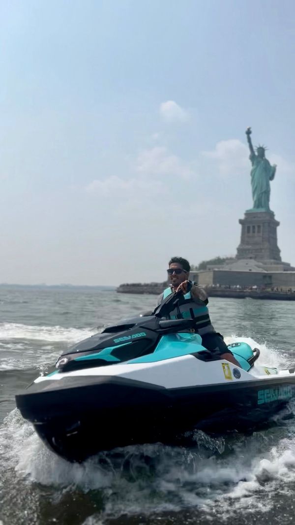 JetSki with the Statue of Liberty Statue of Liberty Tours of New York City Harbor and Landmarks