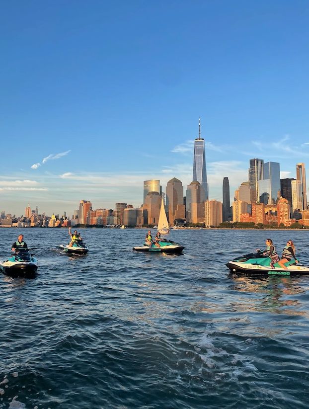 Sunset with a group by the NYC Skyline private session from Jersey Jet Ski across the Hudson River