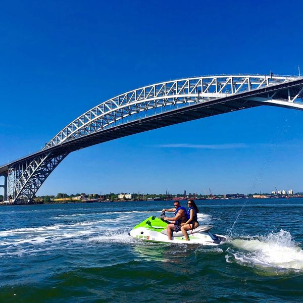 Go under the Outerbridge Crossing on Jersey jet skis river race or statue of liberty tours Staten