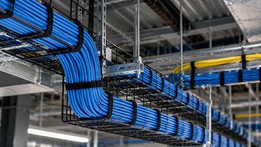 Structured network cabling installation with professionally routed and managed Ethernet cabling in a
