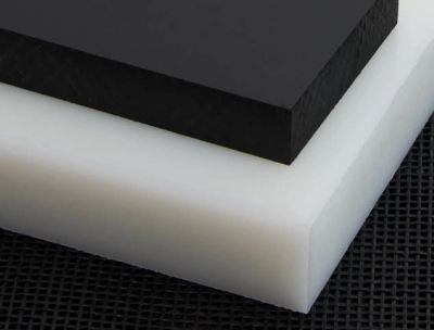 Two stacked rectangular foam or plastic sheets in black and white.