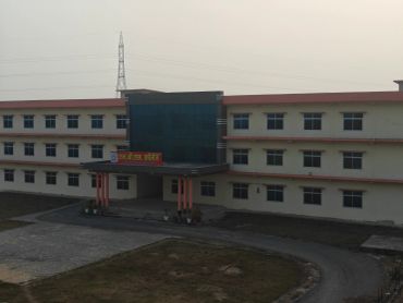 Exterior view of a college building with multiple windows.