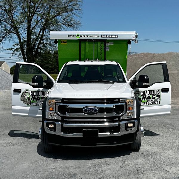 The Hooklift Truck that carries the Dumpsters