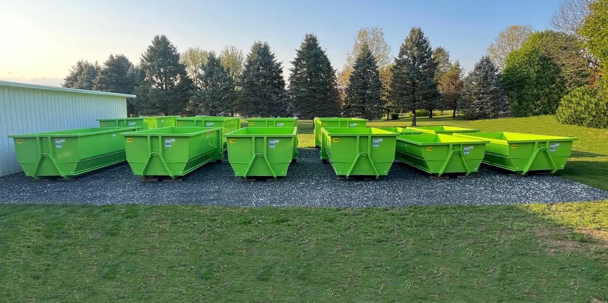 Displays our fleet of 10,15 and 20 yard Dumpsters available for customer rental.