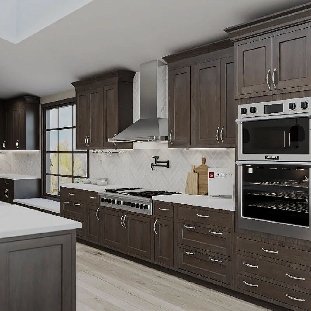 Inset shaker style kitchen in forest brown with white countertops and backsplash