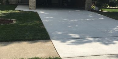 Removed cement in the garage and driveway and replaced !