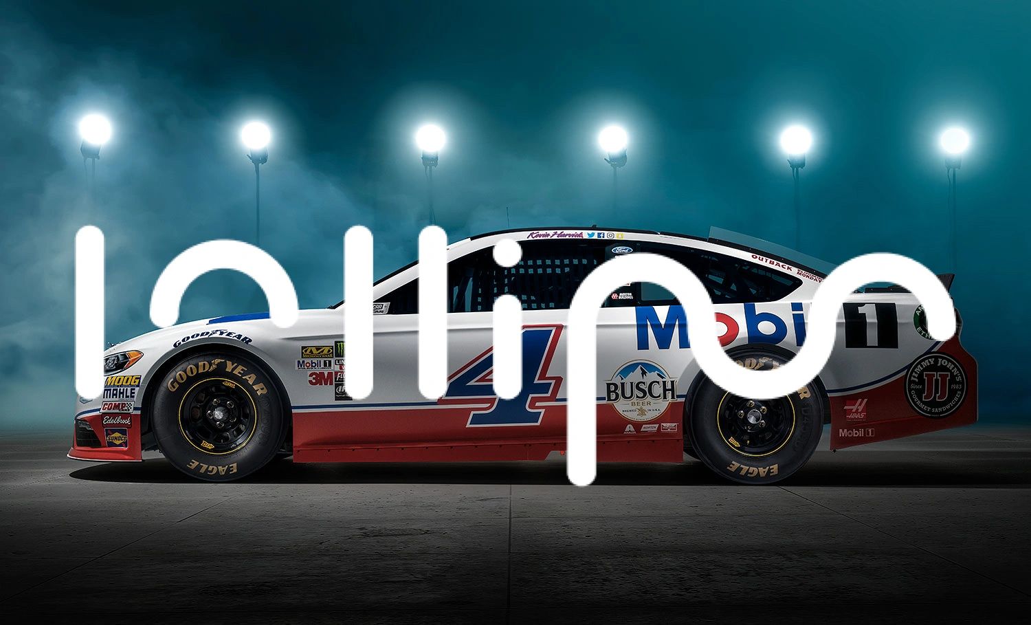 Side view of a race car under bright lights with a LoLipop logo overlay.
