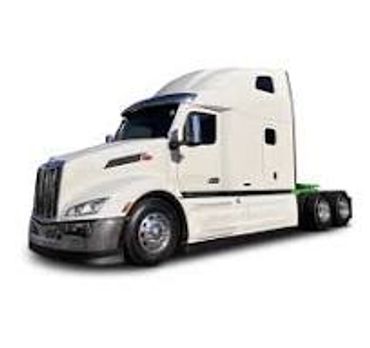 White semi-truck tractor cab with aerodynamic design.
