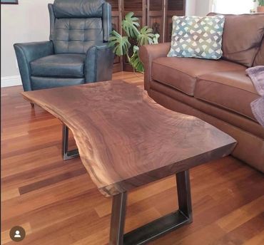 Walnut slab table with steel legs