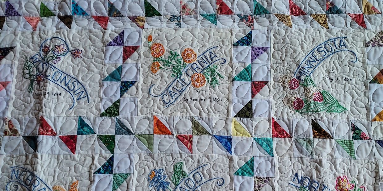 Pieced  and quilted by Julie Reyes  50 state flowers