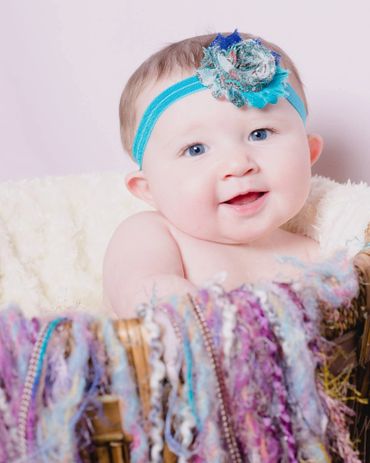Infant photography of baby in a basket