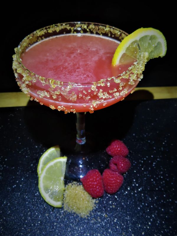 A tasty raspberry lemon drop, the prefect blend of sweet and sour.. a drink worth celebrating